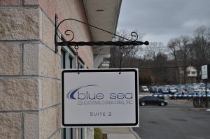 Kulpsville Wayfinding Signs outdoor hanging blade sign blue sea building business wayfinding address sign 300x199